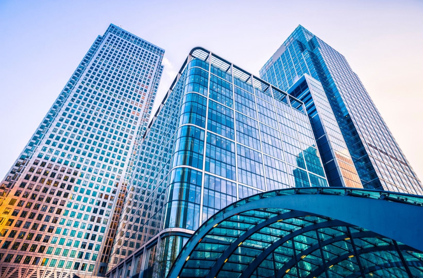 Glass office towers seen from below
